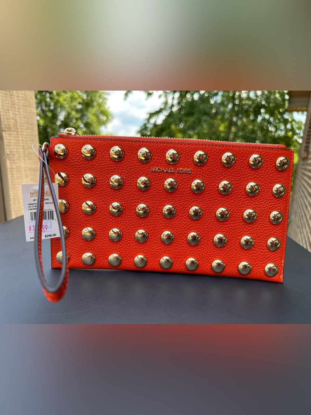 Michael Kors Orange Clutch with Gold Studs